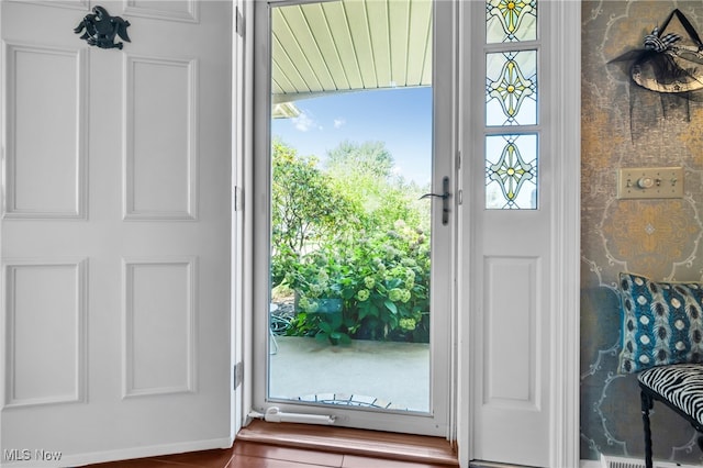 foyer featuring tile patterned flooring