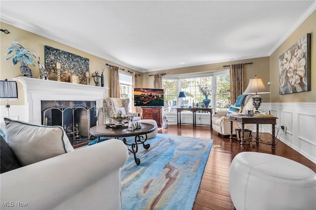 living room featuring a wealth of natural light, dark hardwood / wood-style flooring, and ornamental molding