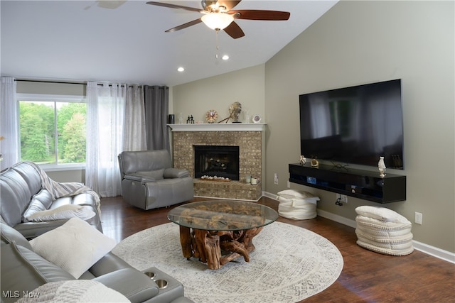 living room featuring lofted ceiling, ceiling fan, and dark hardwood / wood-style flooring