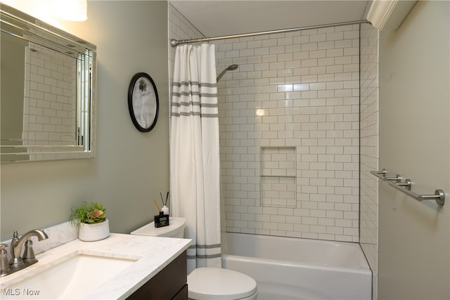 full bathroom featuring vanity, toilet, and shower / bath combo with shower curtain