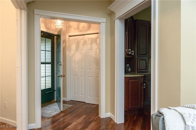 corridor featuring dark hardwood / wood-style flooring