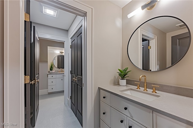 bathroom featuring vanity and tile patterned floors