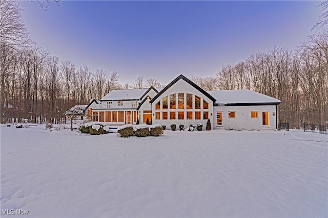 view of snow covered house