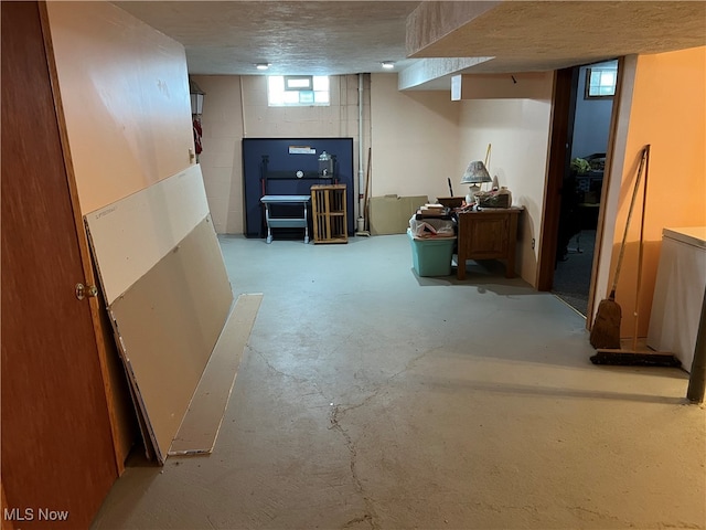 basement with a textured ceiling