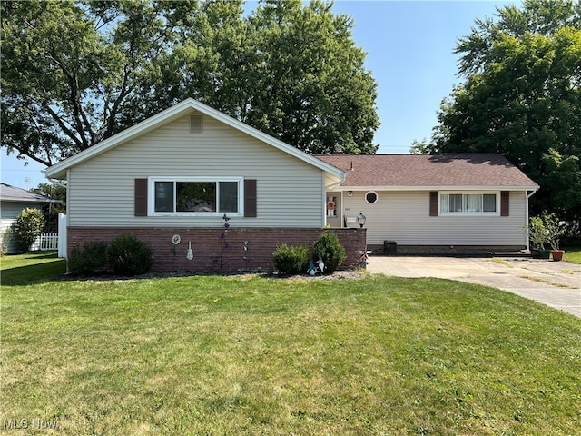 ranch-style house with a front yard