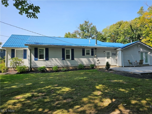 ranch-style home with a patio area and a front yard