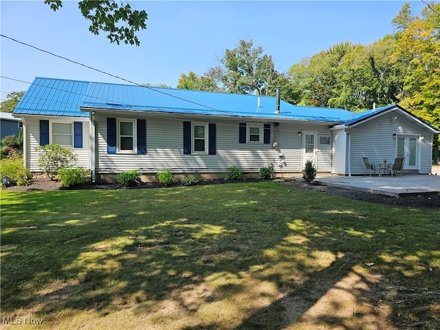 single story home featuring a patio and a front lawn