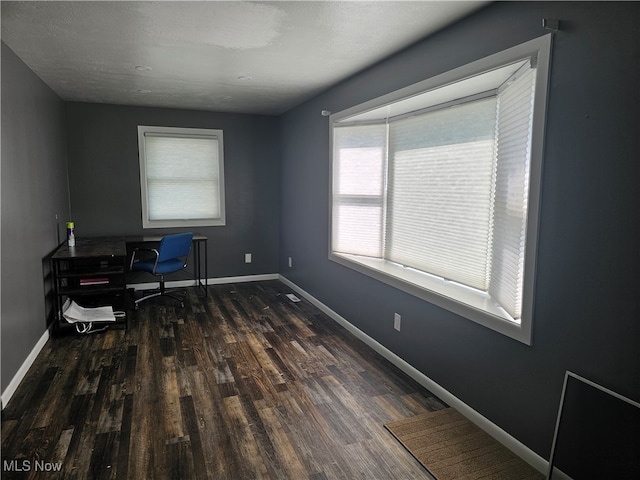 office space featuring dark hardwood / wood-style floors