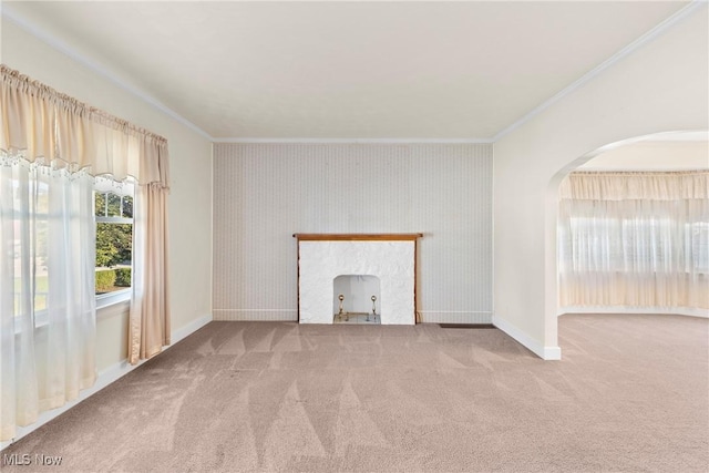 2110 Commerce St, Wellsburg, WV 26070 - unfurnished living room featuring arched walkways, carpet floors, crown molding, baseboards, and a fireplace