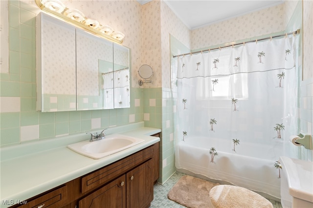 full bathroom featuring vanity, tile walls, toilet, decorative backsplash, and shower / bathtub combination with curtain