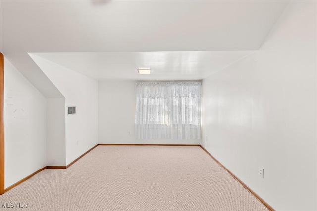 2110 Commerce St, Wellsburg, WV 26070 - bonus room featuring baseboards, visible vents, and carpet