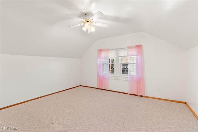 2110 Commerce St, Wellsburg, WV 26070 - bonus room with vaulted ceiling, baseboards, carpet flooring, and a ceiling fan