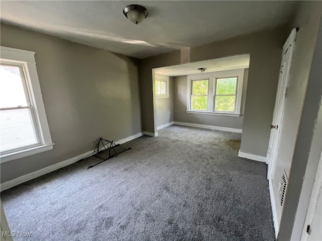 view of carpeted spare room