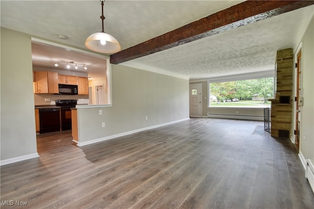 unfurnished living room with a baseboard heating unit, dark hardwood / wood-style floors, beam ceiling, and a textured ceiling