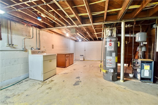 basement with washer / dryer and water heater