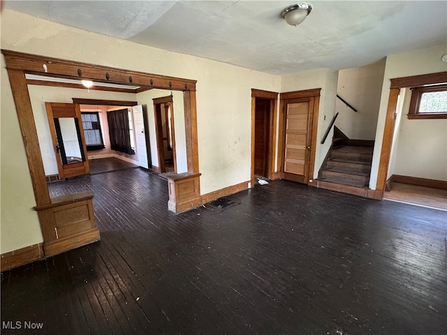 unfurnished room featuring dark hardwood / wood-style floors