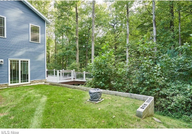 view of yard featuring a deck