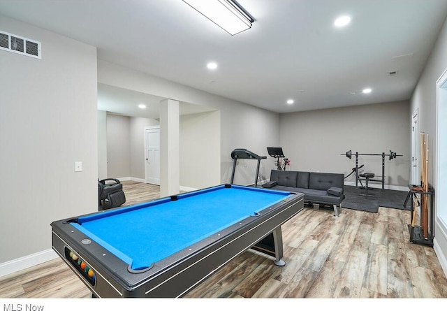 rec room with billiards and hardwood / wood-style flooring