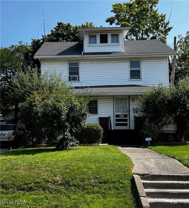 front of property featuring a front lawn