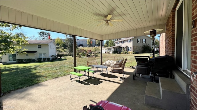 view of patio / terrace with a grill and ceiling fan