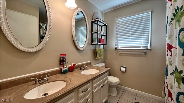 bathroom featuring a shower with shower curtain, tile patterned flooring, toilet, and vanity