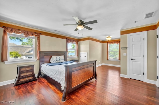 1909 N Nan Ave, Lakeside-Marblehead, OH 43440 - bedroom with baseboards, multiple windows, and hardwood / wood-style flooring