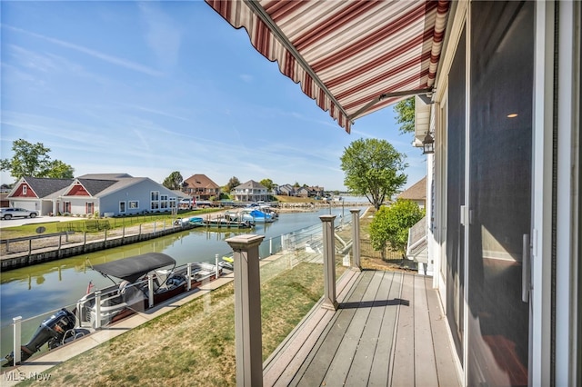 1909 N Nan Ave, Lakeside-Marblehead, OH 43440 - dock featuring a water view, a residential view, and a yard