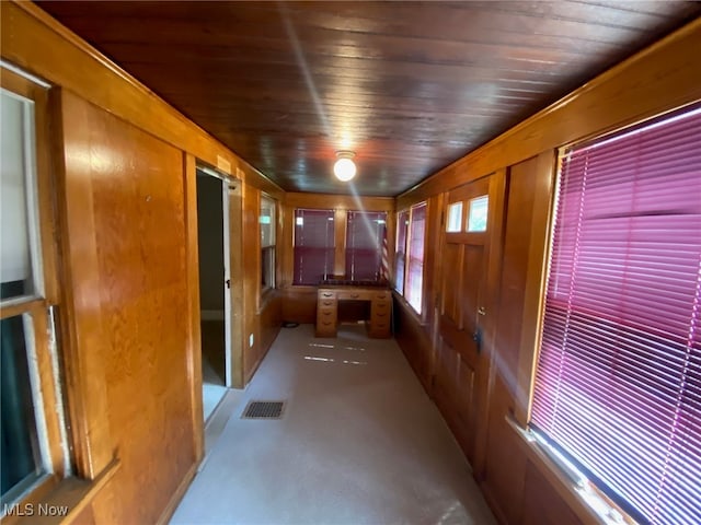 interior space with wood ceiling