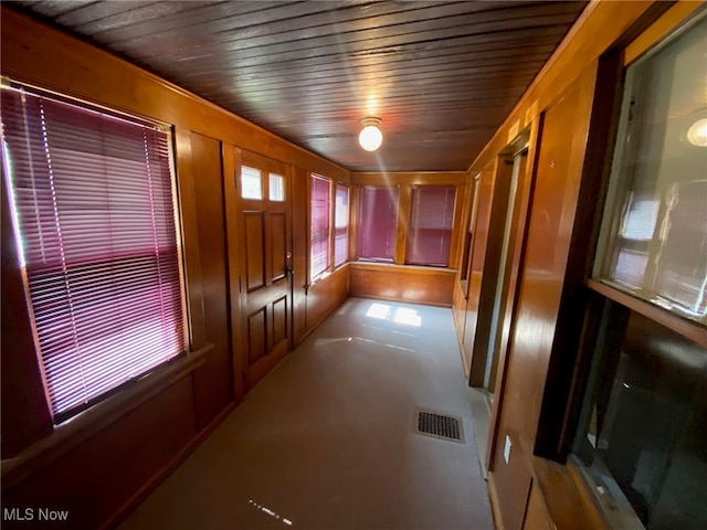 corridor featuring wood ceiling