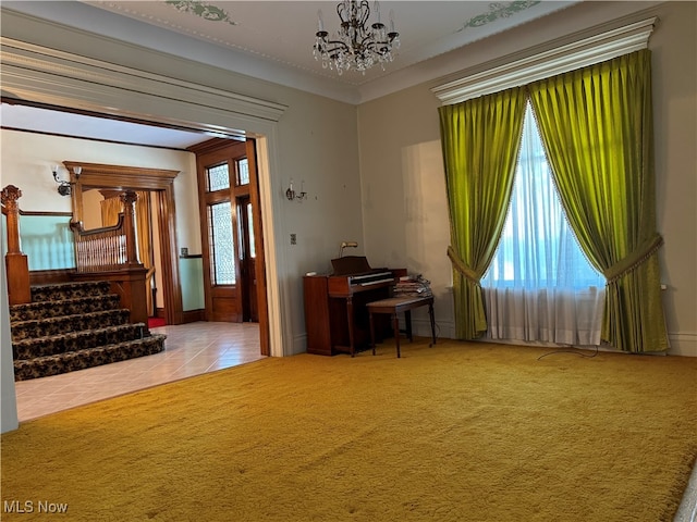 unfurnished office featuring a notable chandelier, a wealth of natural light, and light carpet