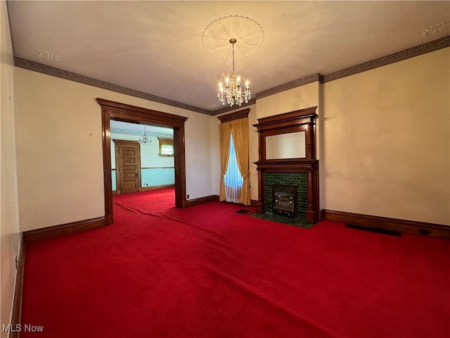 unfurnished living room with an inviting chandelier, carpet, and ornamental molding