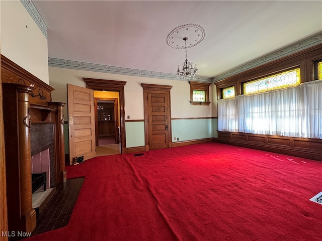 interior space with an inviting chandelier and crown molding