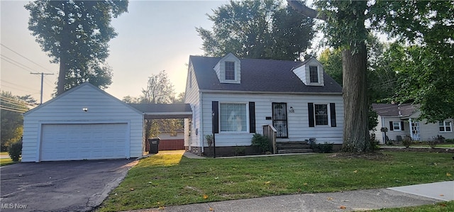 new england style home with a garage and a front lawn