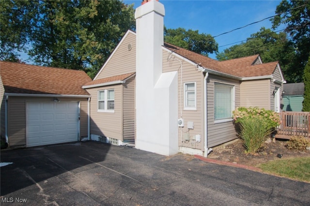 view of home's exterior with a garage