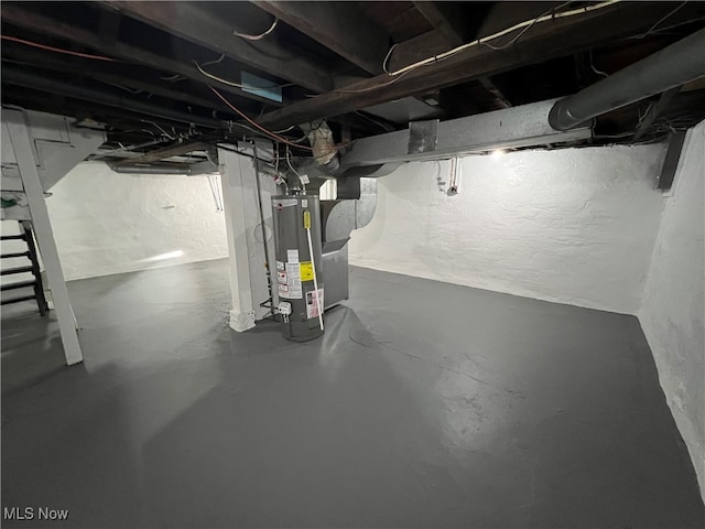 basement featuring gas water heater