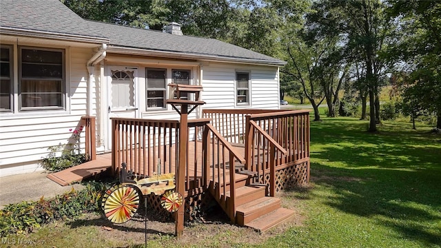 wooden deck with a yard