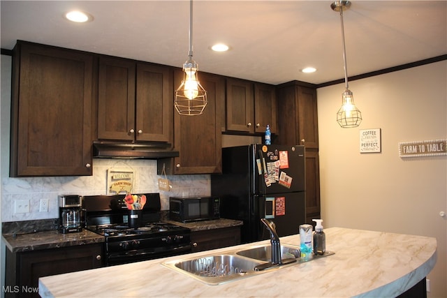 kitchen featuring black appliances, ornamental molding, dark brown cabinetry, and sink