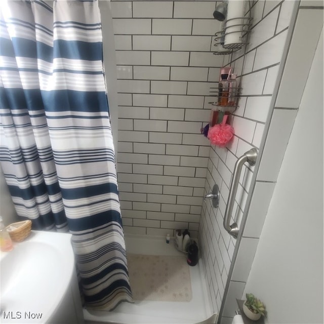 bathroom with walk in shower