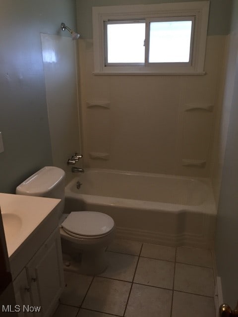 full bathroom with tile patterned floors, vanity, toilet, and shower / washtub combination