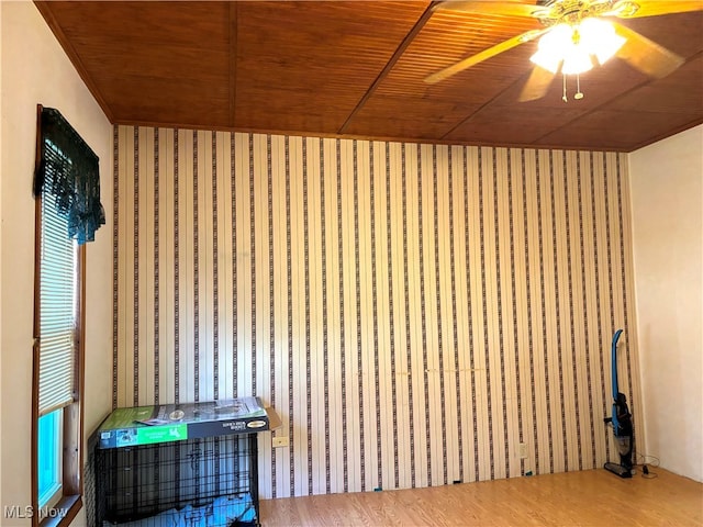 interior space featuring wooden ceiling, hardwood / wood-style flooring, and ceiling fan