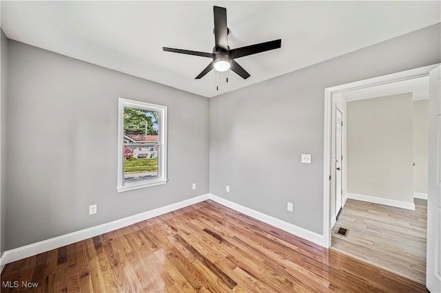 unfurnished room with light hardwood / wood-style floors and ceiling fan