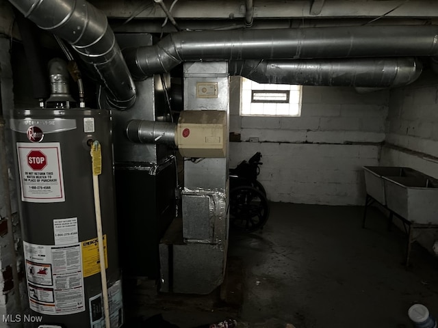 utility room with gas water heater