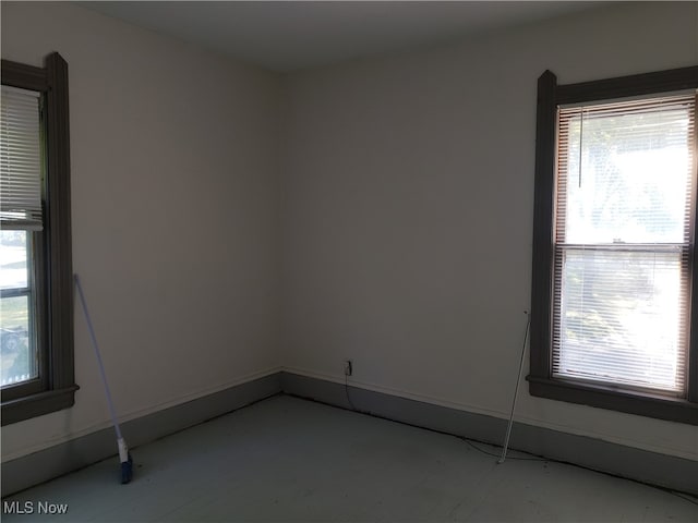 spare room featuring plenty of natural light