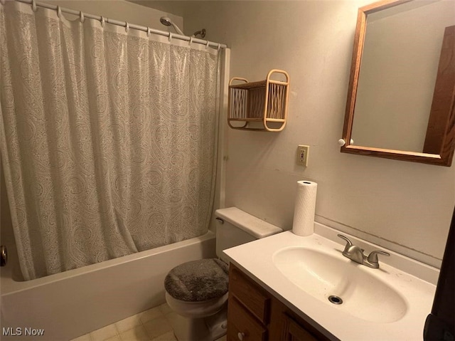 full bathroom with vanity, toilet, shower / bath combination with curtain, and tile patterned flooring