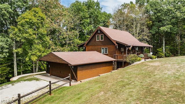 exterior space featuring a yard and a garage