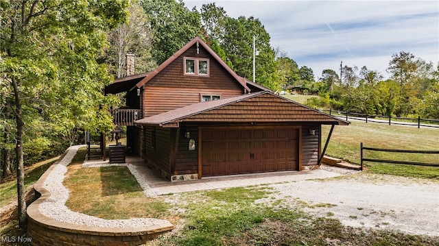 garage with a lawn