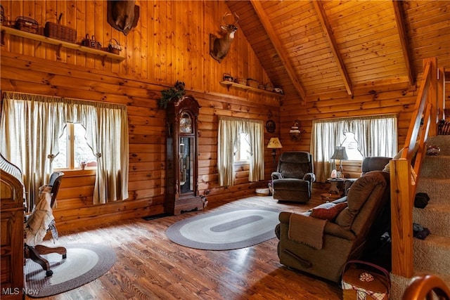 2207 Veto Rd, Vincent, OH 45784 - living area featuring wood ceiling with exposed beams, plenty of natural light, wood finished floors, wooden walls, and high vaulted ceiling