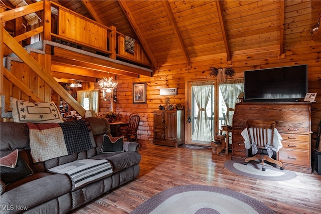 living room featuring wood ceiling, beamed ceiling, wood-type flooring, and a chandelier