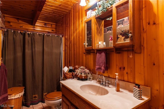 2207 Veto Rd, Vincent, OH 45784 - full bathroom with wood ceiling, vanity, wood walls, toilet, and tile patterned flooring
