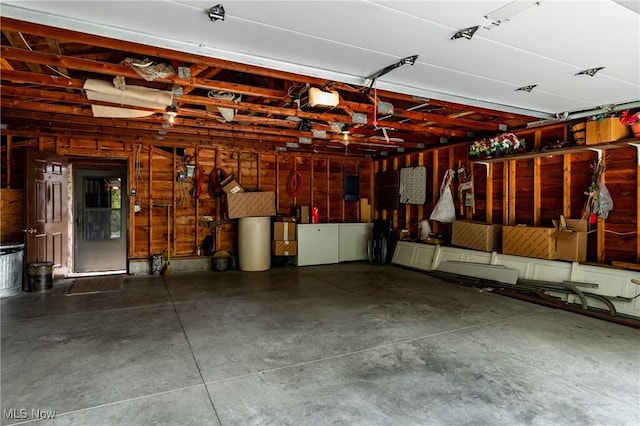 2207 Veto Rd, Vincent, OH 45784 - garage featuring a garage door opener